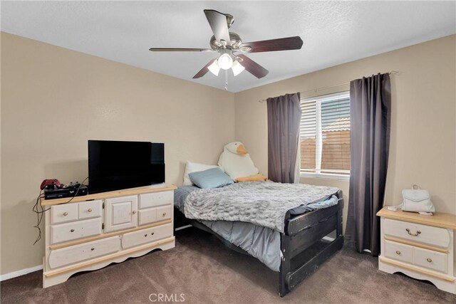 9275 Verdugo Ave, Hesperia, CA 92345 - bedroom featuring dark carpet and a ceiling fan
