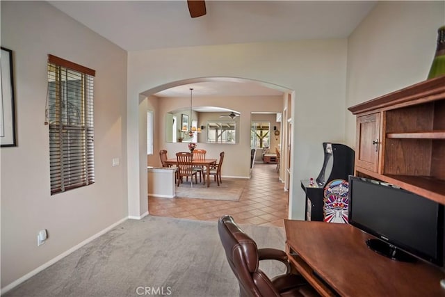17334 Sierra Sunrise Ln, Canyon Country, CA 91387 - office space with arched walkways, a ceiling fan, baseboards, and light tile patterned flooring