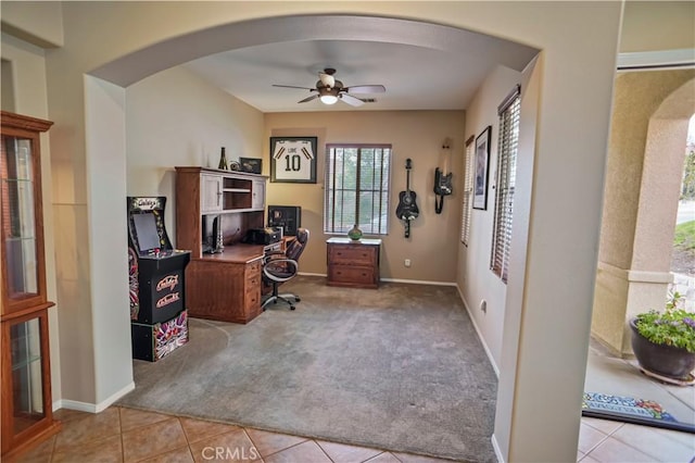 17334 Sierra Sunrise Ln, Canyon Country, CA 91387 - office space featuring arched walkways, carpet, a ceiling fan, and tile patterned floors