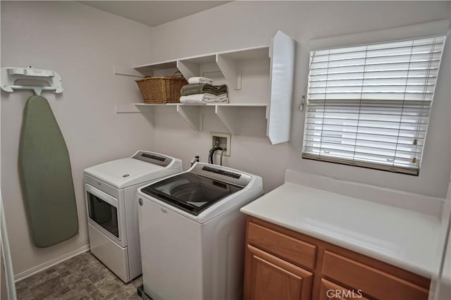 17334 Sierra Sunrise Ln, Canyon Country, CA 91387 - laundry room with washing machine and dryer and cabinet space