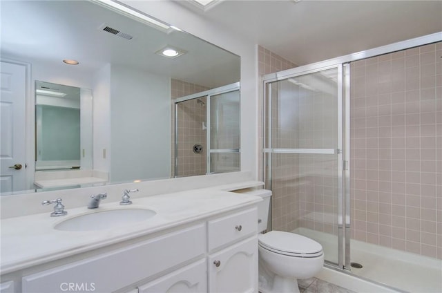 6052 Shadowbrook Cir, Huntington Beach, CA 92648 - full bath featuring vanity, a shower stall, toilet, and recessed lighting