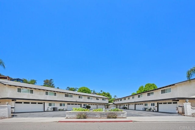 3404 Oak Cliff Dr Unit 2, Fallbrook, CA 92028 - view of front of property with stucco siding and a garage