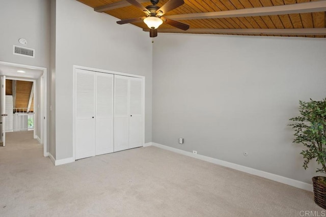 3404 Oak Cliff Dr Unit 2, Fallbrook, CA 92028 - unfurnished bedroom featuring light colored carpet, wooden ceiling with exposed beams, and baseboards