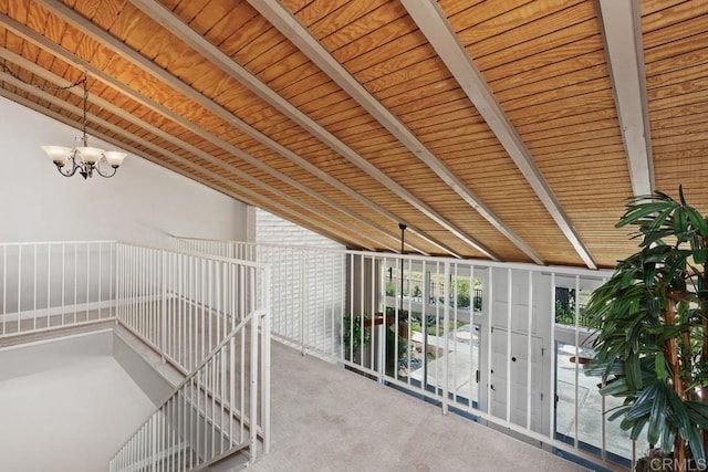 3404 Oak Cliff Dr Unit 2, Fallbrook, CA 92028 - corridor featuring a chandelier, carpet flooring, a wall of windows, and wooden ceiling