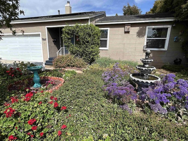 4349 Yale Ave, La Mesa, CA 91942 - back of house with a chimney and an attached garage