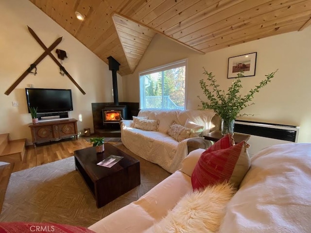 53434 Redwood Dr Unit B, Springville, CA 93265 - living area with wood ceiling, wood finished floors, a wood stove, and vaulted ceiling
