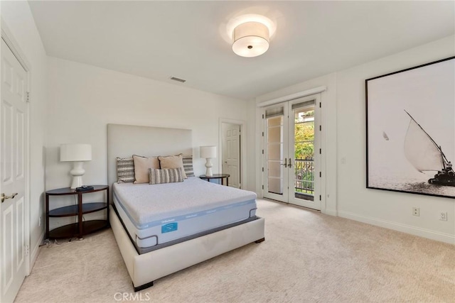 12 Via Avoria, Newport Coast, CA 92657 - bedroom with access to exterior, light colored carpet, and baseboards