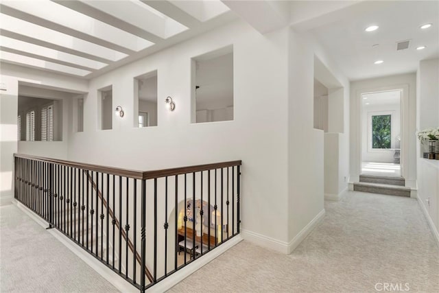 12 Via Avoria, Newport Coast, CA 92657 - corridor featuring carpet flooring, baseboards, recessed lighting, and an upstairs landing