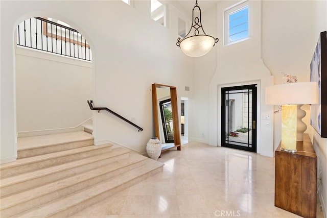 12 Via Avoria, Newport Coast, CA 92657 - foyer entrance featuring a towering ceiling, stairs, and baseboards