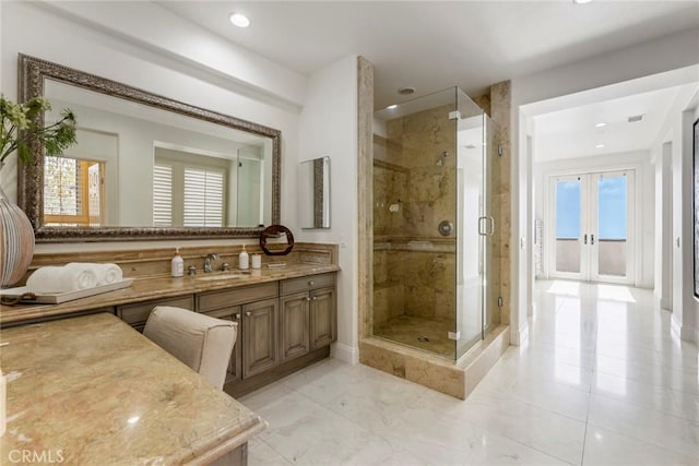 12 Via Avoria, Newport Coast, CA 92657 - full bath with vanity, a stall shower, recessed lighting, and french doors