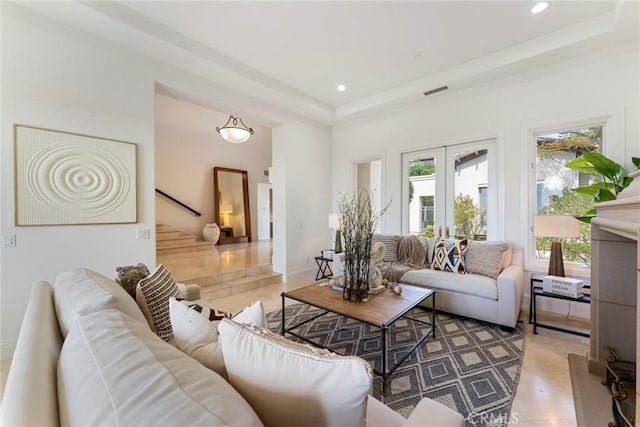 12 Via Avoria, Newport Coast, CA 92657 - living room with healthy amount of natural light, stairway, a raised ceiling, recessed lighting, and light tile patterned flooring