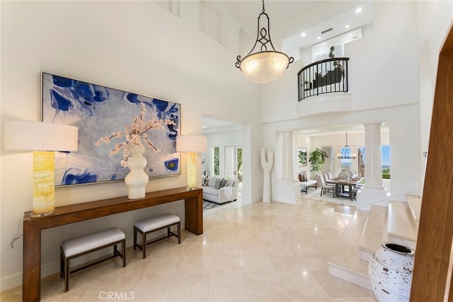 12 Via Avoria, Newport Coast, CA 92657 - entrance foyer with decorative columns, a towering ceiling, marble tiled floors, and recessed lighting