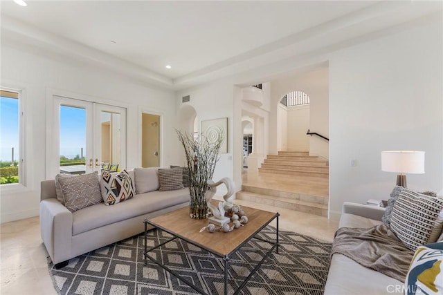 12 Via Avoria, Newport Coast, CA 92657 - tiled living area with french doors, arched walkways, baseboards, recessed lighting, and stairs