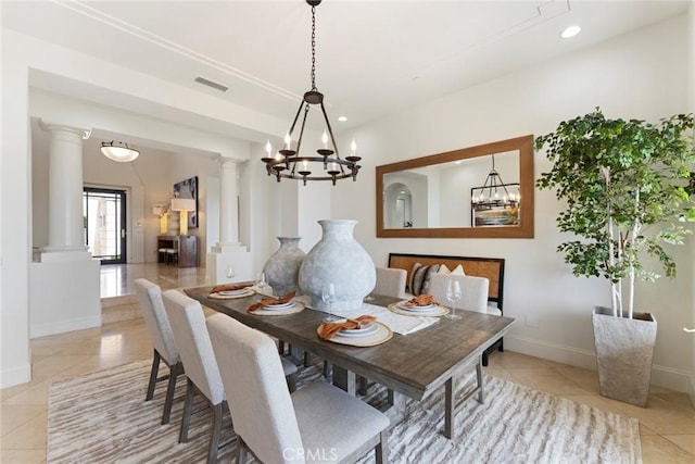12 Via Avoria, Newport Coast, CA 92657 - dining space with light tile patterned flooring, a chandelier, baseboards, ornate columns, and recessed lighting