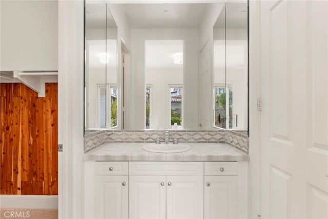 12 Via Avoria, Newport Coast, CA 92657 - bathroom featuring vanity and decorative backsplash