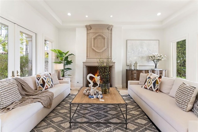 12 Via Avoria, Newport Coast, CA 92657 - living area with plenty of natural light, recessed lighting, a raised ceiling, and a fireplace