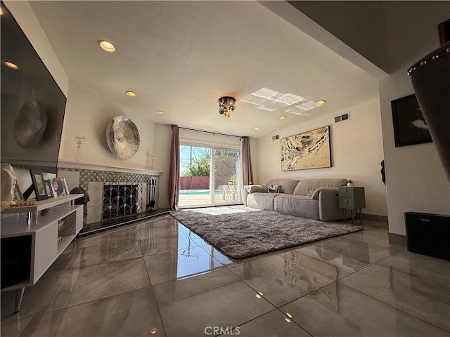 20630 Collegewood Dr, Walnut, CA 91789 - living room with marble tiled flooring, a fireplace, and recessed lighting