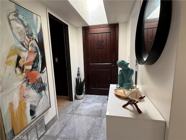 20630 Collegewood Dr, Walnut, CA 91789 - entryway featuring baseboards and light tile patterned floors