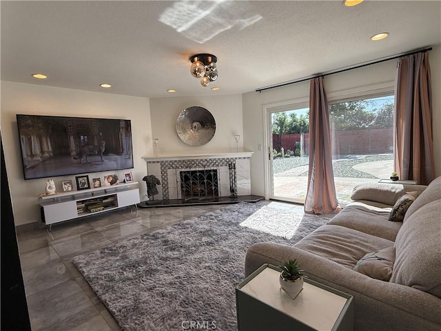 20630 Collegewood Dr, Walnut, CA 91789 - living room with recessed lighting, a fireplace, and a textured ceiling
