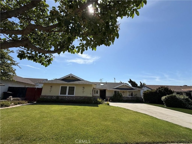 20630 Collegewood Dr, Walnut, CA 91789 - ranch-style home featuring stone siding, stucco siding, a front yard, and concrete driveway