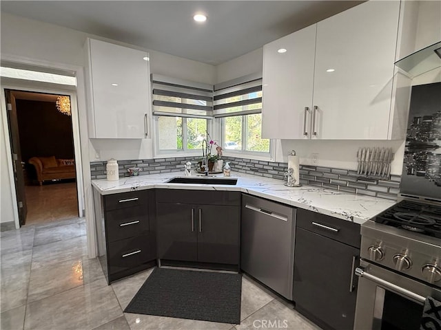 20630 Collegewood Dr, Walnut, CA 91789 - kitchen featuring stainless steel dishwasher, a sink, white cabinets, light stone countertops, and recessed lighting