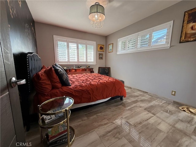 20630 Collegewood Dr, Walnut, CA 91789 - bedroom featuring multiple windows, a chandelier, and baseboards