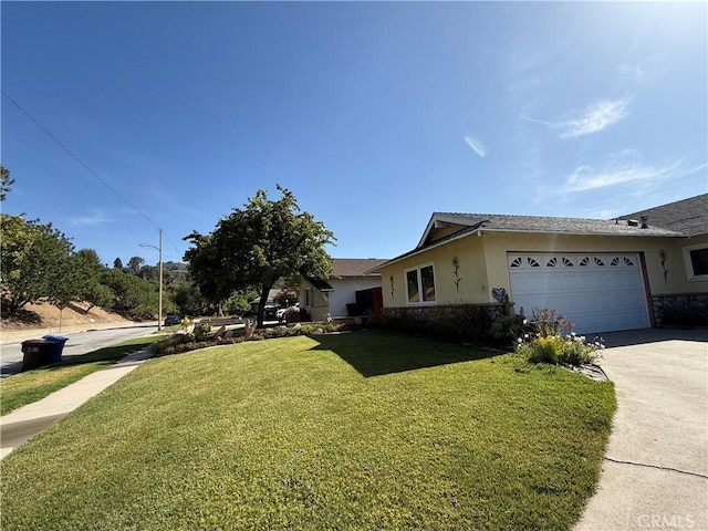 20630 Collegewood Dr, Walnut, CA 91789 - view of side of home with concrete driveway, stucco siding, a yard, a garage, and stone siding