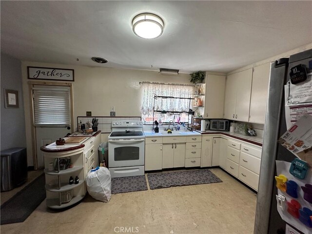 159 S Shasta St S, Willows, CA 95988 - kitchen with electric stove, open shelves, light flooring, a sink, and light countertops
