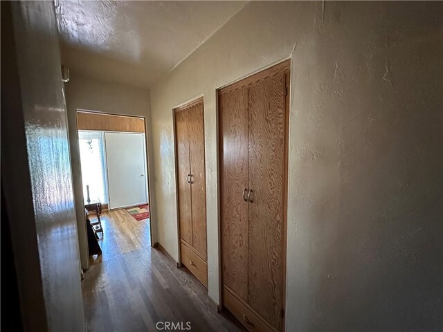 159 S Shasta St S, Willows, CA 95988 - hall with wood finished floors and a textured wall