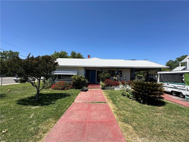 159 S Shasta St S, Willows, CA 95988 - ranch-style house with a front lawn, a porch, and a chimney