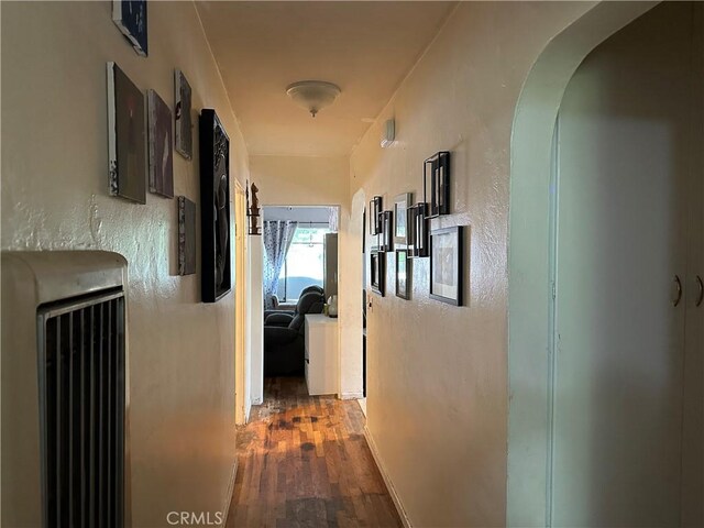 159 S Shasta St S, Willows, CA 95988 - corridor featuring wood finished floors and arched walkways
