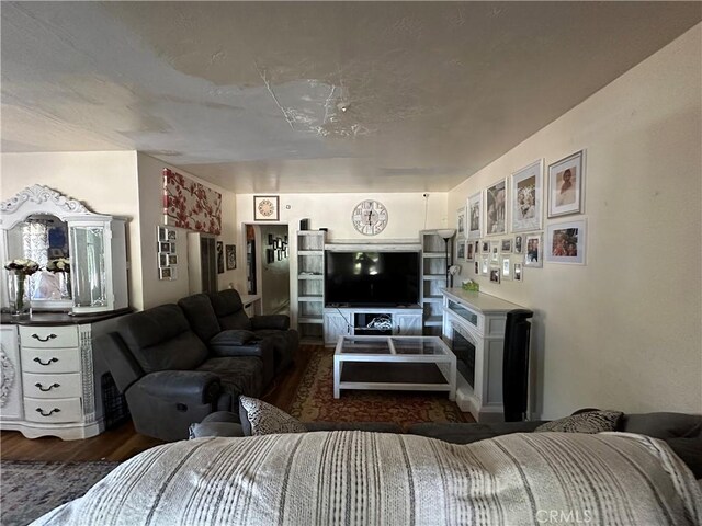 159 S Shasta St S, Willows, CA 95988 - living area with wood finished floors and a fireplace