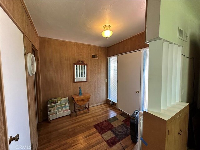 159 S Shasta St S, Willows, CA 95988 - foyer entrance featuring wood finished floors and wood walls