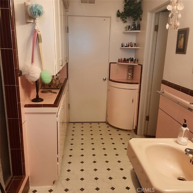 159 S Shasta St S, Willows, CA 95988 - bathroom featuring tile patterned floors and a sink
