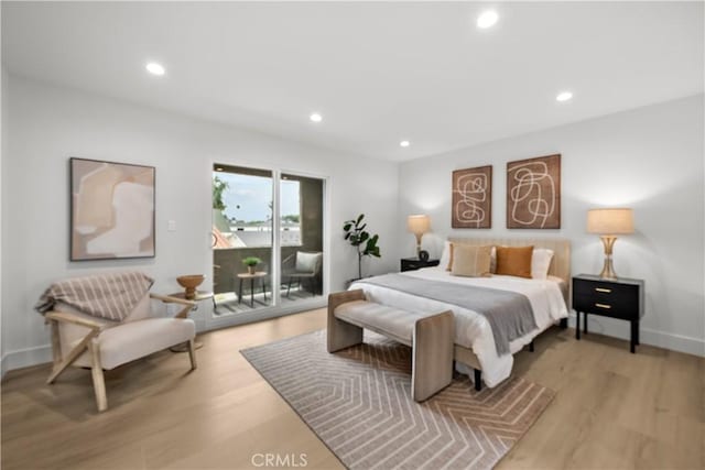 7061 Kester Ave Unit H, Van Nuys, CA 91405 - bedroom with access to exterior, recessed lighting, light wood-type flooring, and baseboards