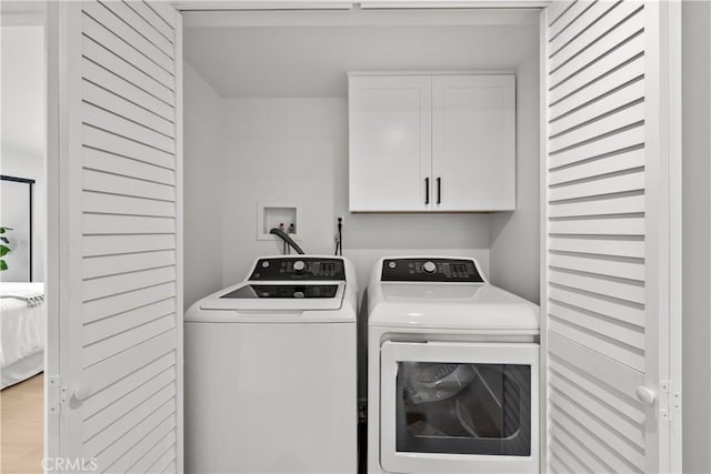 7061 Kester Ave Unit H, Van Nuys, CA 91405 - laundry room with cabinet space and washer and clothes dryer