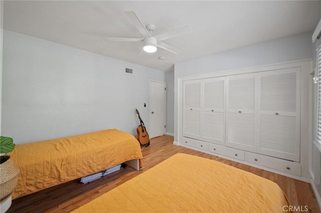 20955 De Mina St, Woodland Hills, CA 91364 - bedroom with wood finished floors, a closet, and a ceiling fan