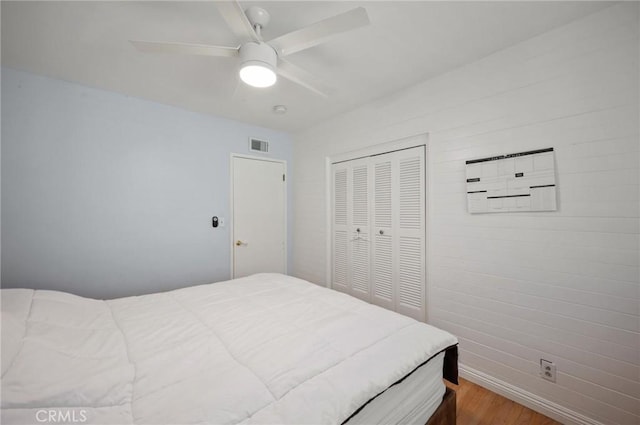 20955 De Mina St, Woodland Hills, CA 91364 - bedroom with wood finished floors, a closet, and a ceiling fan