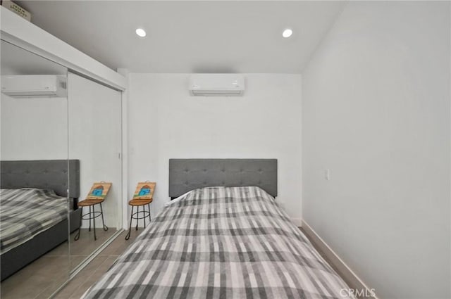 20955 De Mina St, Woodland Hills, CA 91364 - bedroom with a wall mounted AC, recessed lighting, and a closet
