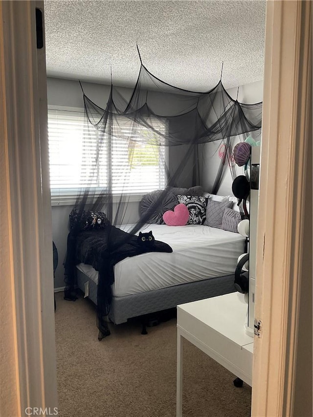 2113 N Lewis St, Santa Ana, CA 92706 - bedroom with a textured ceiling and carpet floors