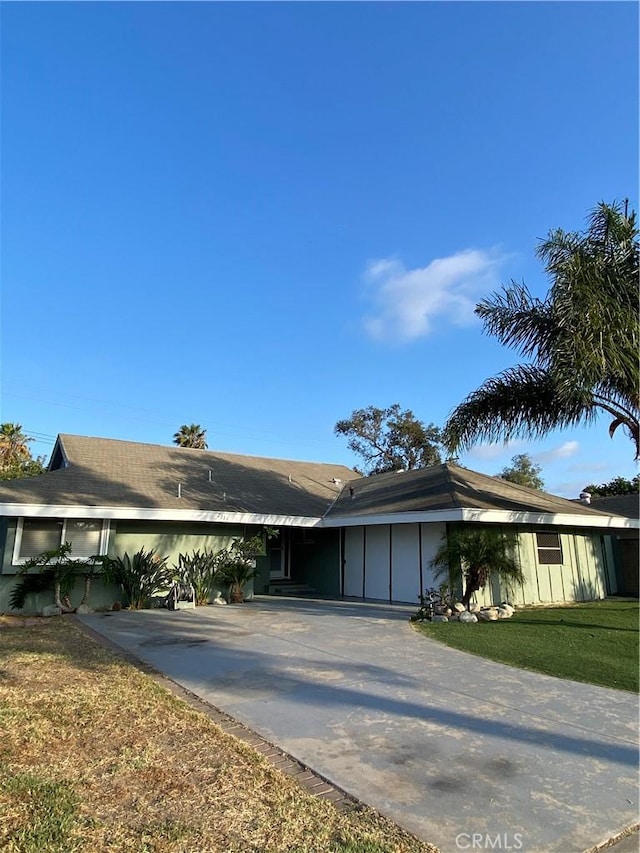2113 N Lewis St, Santa Ana, CA 92706 - single story home featuring driveway, a front lawn, and an attached carport