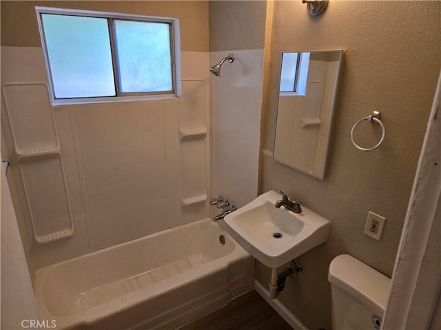 6025 Florence St, Riverside, CA 92504 - full bathroom with shower / bathtub combination, toilet, a sink, and a textured wall