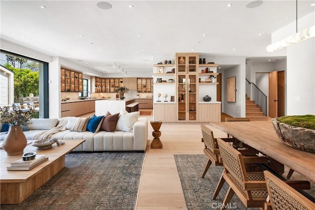 4314 Teesdale Ave, Studio City, CA 91604 - living area featuring stairway, light wood-type flooring, and recessed lighting