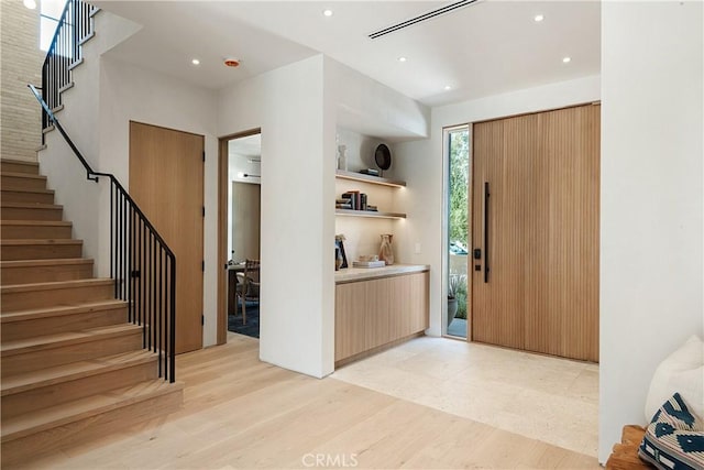 4314 Teesdale Ave, Studio City, CA 91604 - foyer entrance featuring stairway, recessed lighting, and light wood finished floors