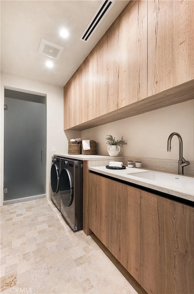 4314 Teesdale Ave, Studio City, CA 91604 - washroom with washing machine and dryer and cabinet space