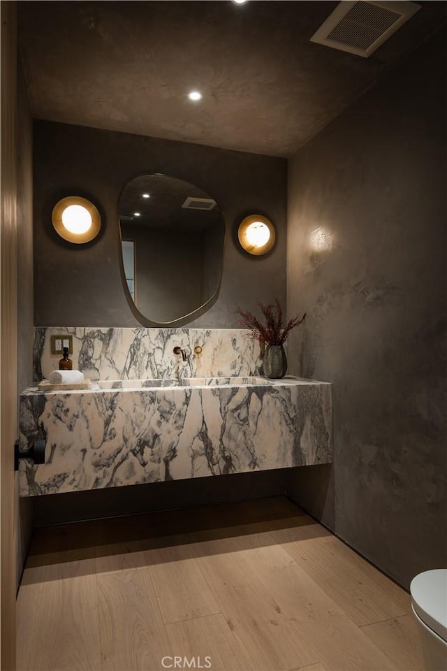 4314 Teesdale Ave, Studio City, CA 91604 - bathroom featuring wood finished floors, toilet, and recessed lighting