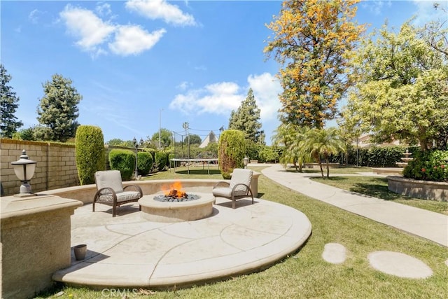 9455 Brandon Ct, Northridge, CA 91325 - view of home's community with a patio area, a fire pit, and a lawn