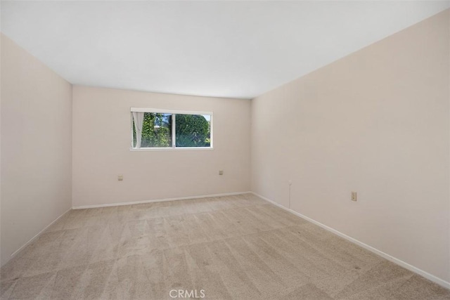 2117 Via Puerta Unit A, Laguna Woods, CA 92637 - empty room with light carpet and baseboards