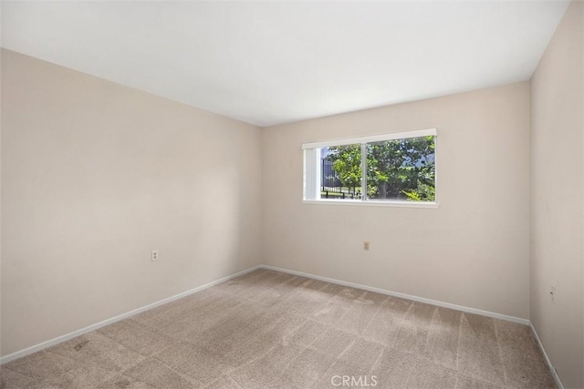 2117 Via Puerta Unit A, Laguna Woods, CA 92637 - spare room with light carpet and baseboards