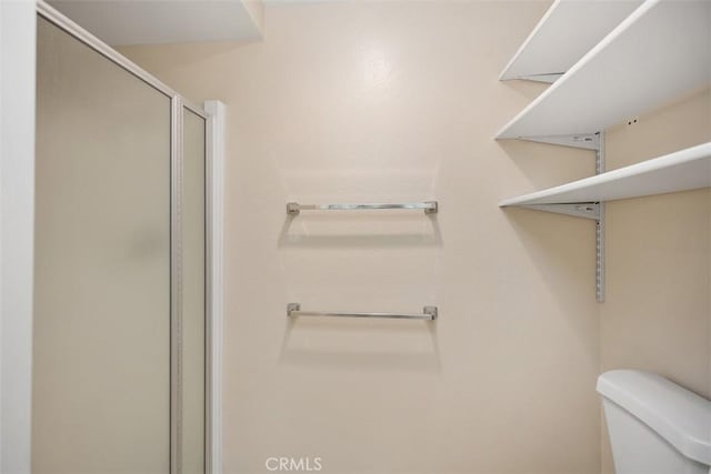 2117 Via Puerta Unit A, Laguna Woods, CA 92637 - full bathroom with a shower stall and toilet